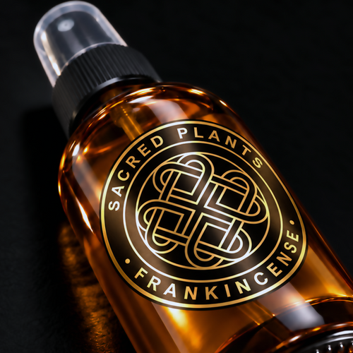 Dhofar Royal Hojari Frankincense Hydrosol amber spray bottle with black and reflective gold foil Sacred Plants label, studio macro photograph