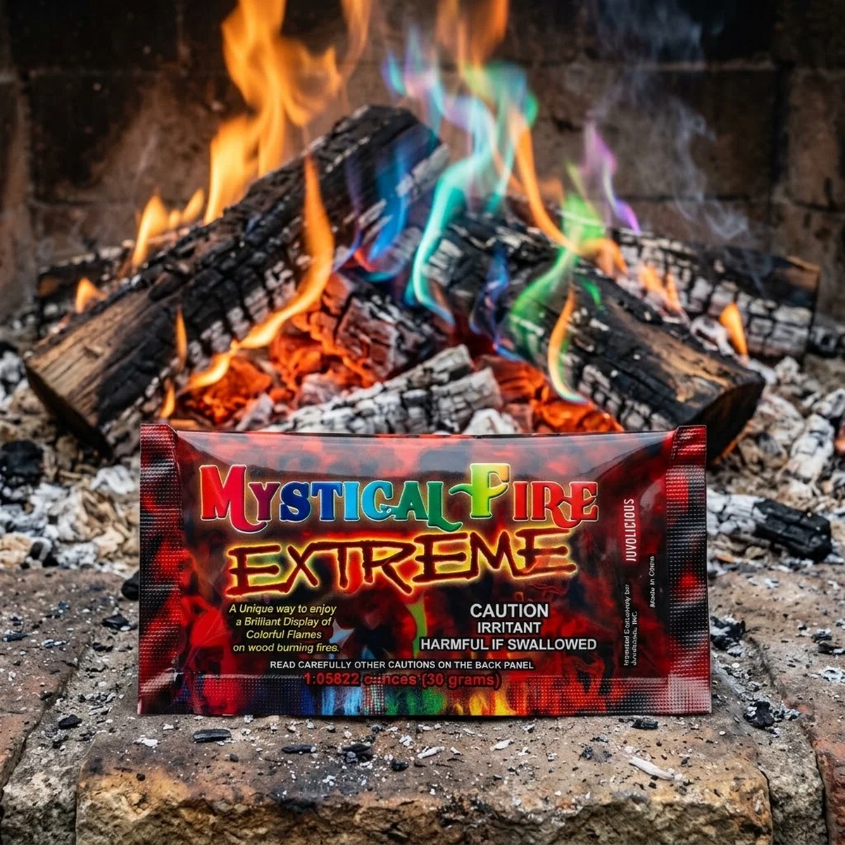 Mystical Fire Extreme sealed packet in front of a multicoloured wood fire