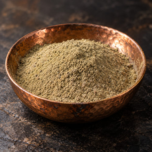 Bobinsana (Calliandra angustifolia) fine bark powder in a hammered copper bowl