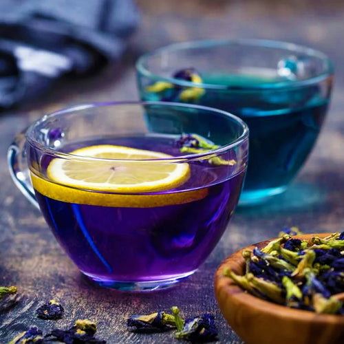 Clitoria ternatea butterfly pea flower tea showing the blue to purple colour change with lemon
