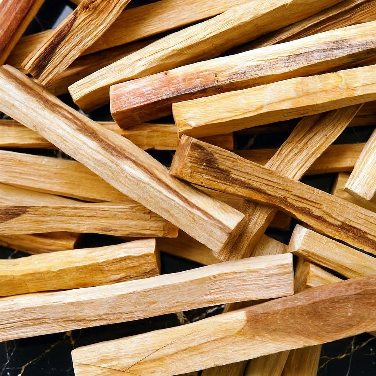 Close-up of Peruvian Palo Santo sticks showing natural wood grain