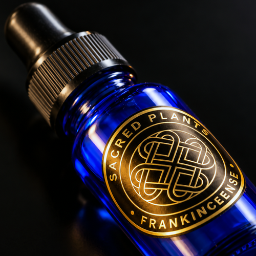 Dhofar Frankincense Essential Oil | Boswellia sacra – cobalt-blue 10 ml dropper bottle with Sacred Plants Australia gold foil label on a black studio surface